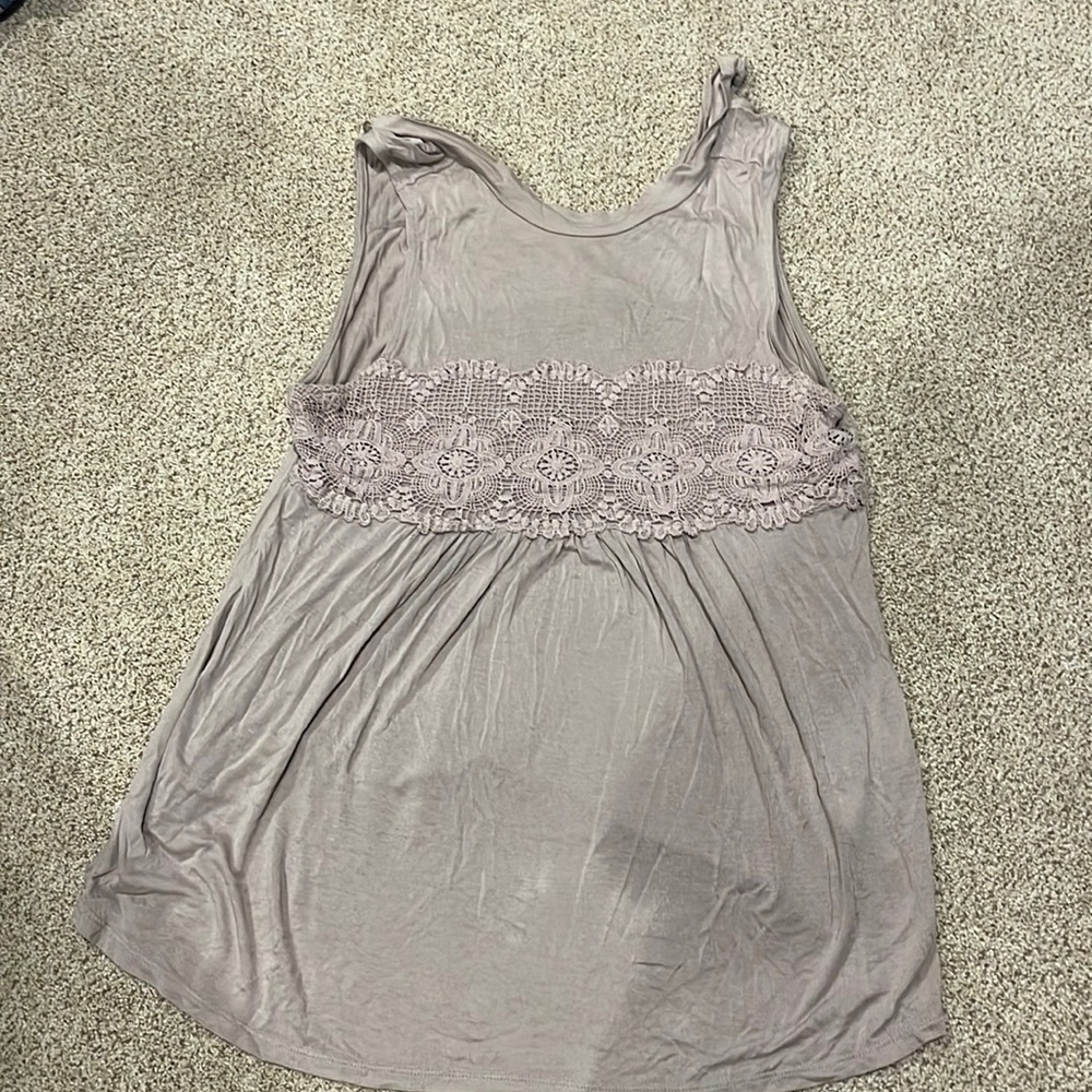 Womens size small Maurices tank top. The color is a light brown.